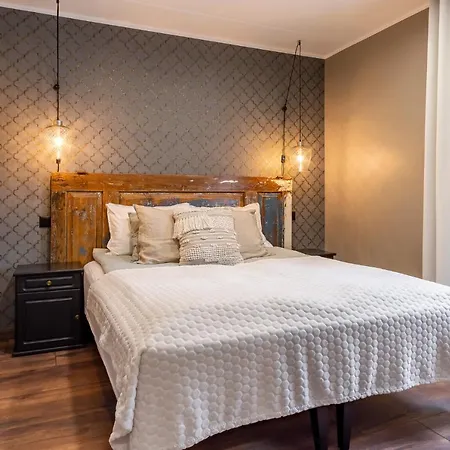 Guest house Alice Backyard - Apartments, & Exclusive Cave Saunas Parnu