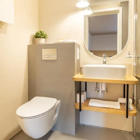 Konukevi Alice Backyard - Apartments, & Exclusive Cave Saunas